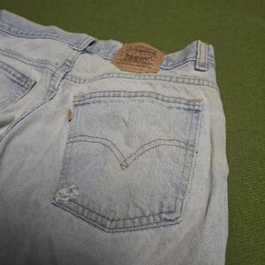 Vintage Distressed Levi's Light Blue Relaxed Men’s Jeans - Back Pocket Detail